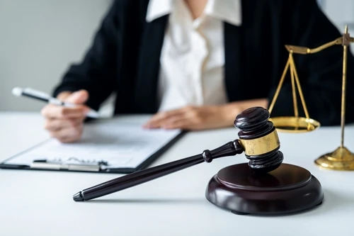 A catastrophic injury lawyer at Car Crash Lawyers SC reviews legal documents.