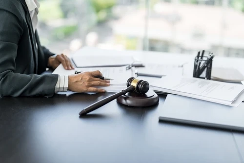 A Greenwood pedestrian accident lawyer at Car Crash Lawyers SC reviews case documents.
