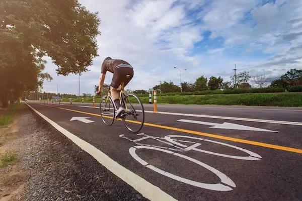 Cyclist riding in a designated bicycle lane in South Carolina