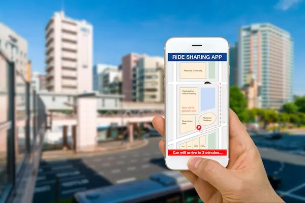 Rideshare app on smartphone representing Uber and Lyft accident claims in Greenwood