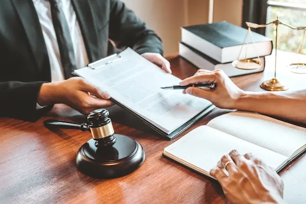 Pedestrian accident lawyer reviewing a client's case